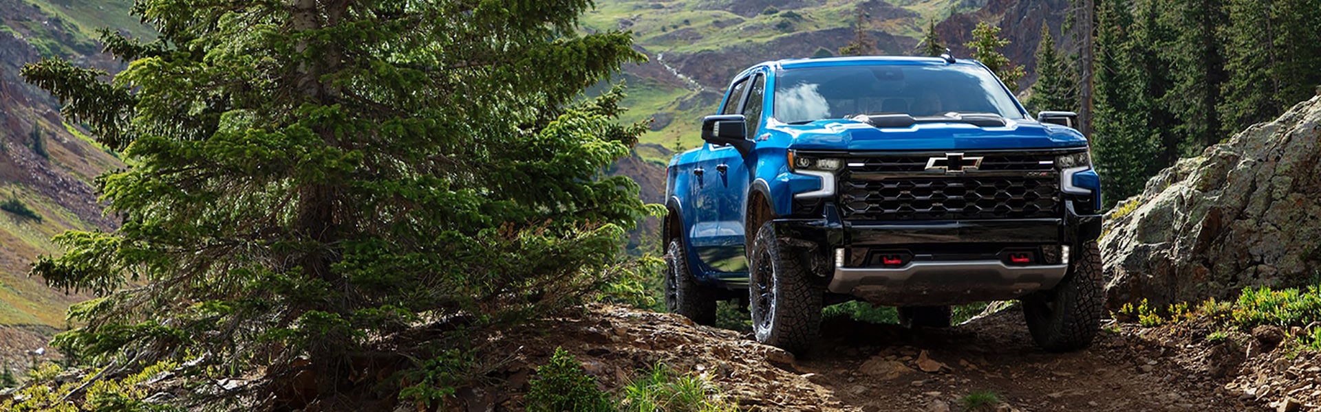 Blue Silverado off roading