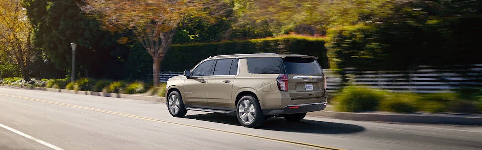 A Suburban SUV running with high speed on Highway
